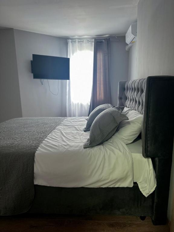 Postel nebo postele na pokoji v ubytování Hôtel Séjour D'Ardenne