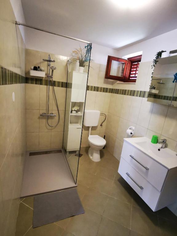 Koupelna v ubytování Holiday Home Cvitka