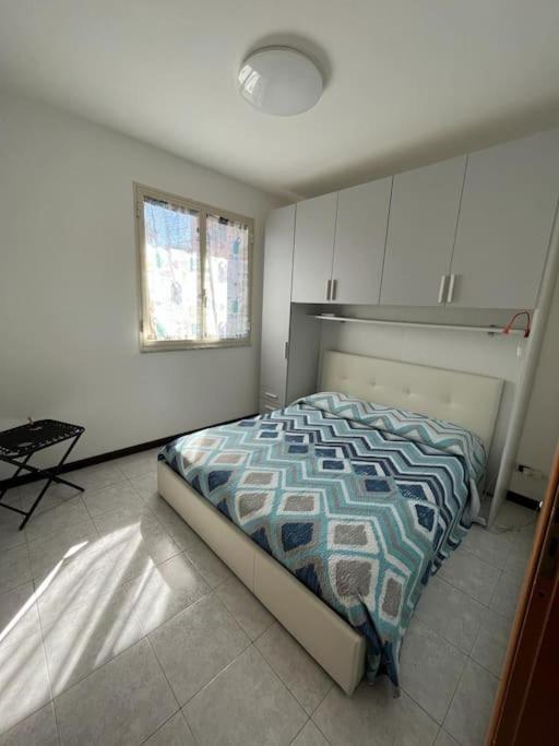 Postel nebo postele na pokoji v ubytování Serenity House 80mq vista mare