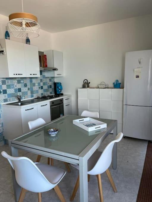 Kuchyň nebo kuchyňský kout v ubytování Serenity House 80mq vista mare