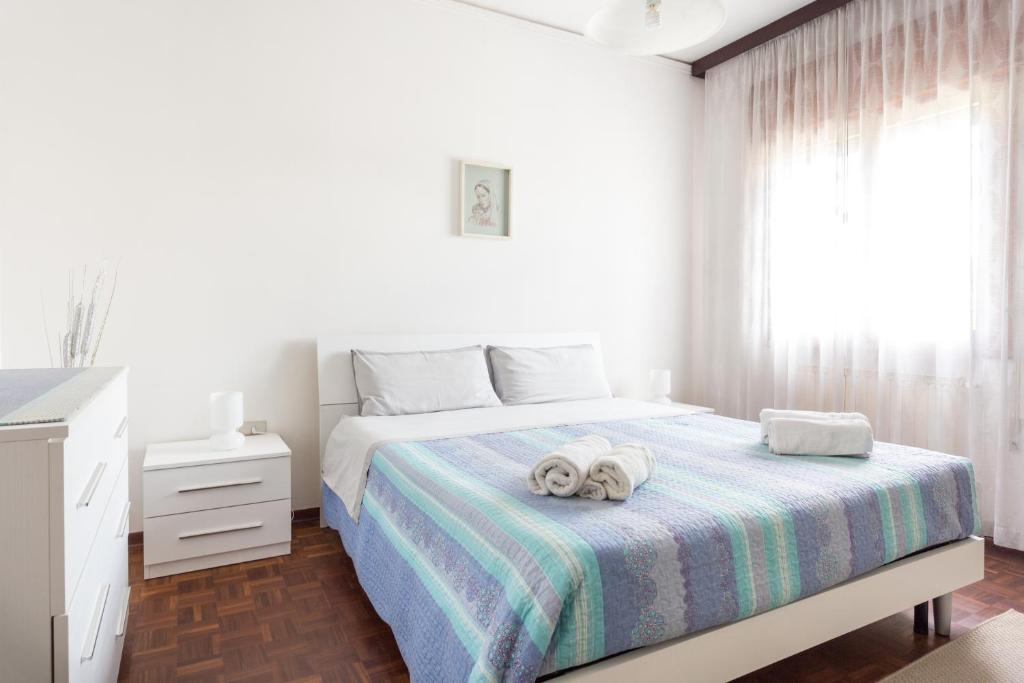 Łóżko lub łóżka w pokoju w obiekcie Home Near Venice