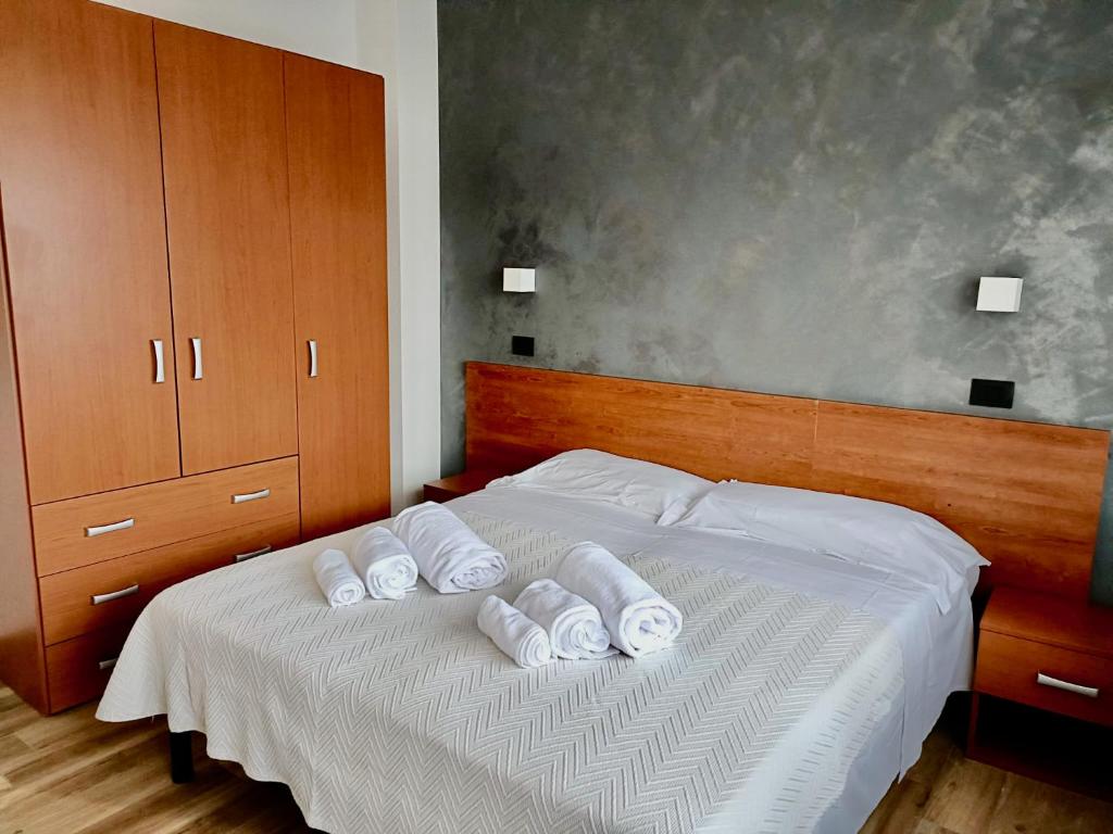 Postel nebo postele na pokoji v ubytování Hotel Il Moro