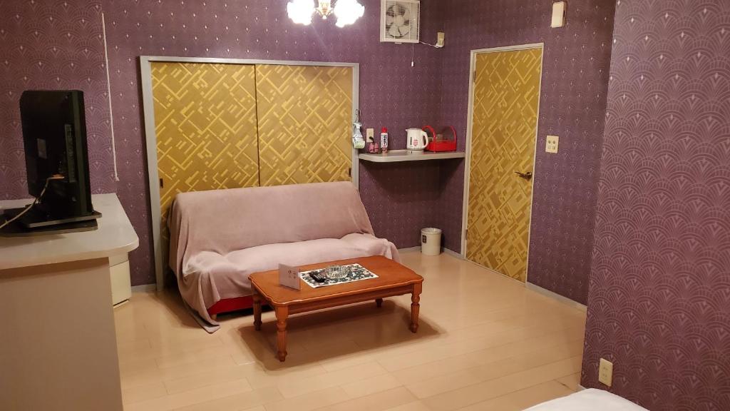 Postel nebo postele na pokoji v ubytování ホテル夢の里