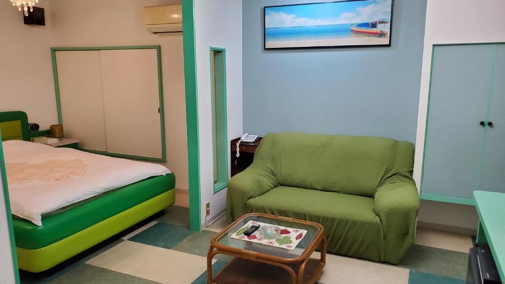 Postel nebo postele na pokoji v ubytování ホテル夢の里