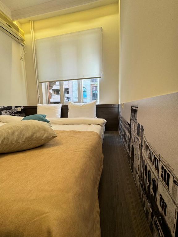 Postel nebo postele na pokoji v ubytování Centroom boutique hotel