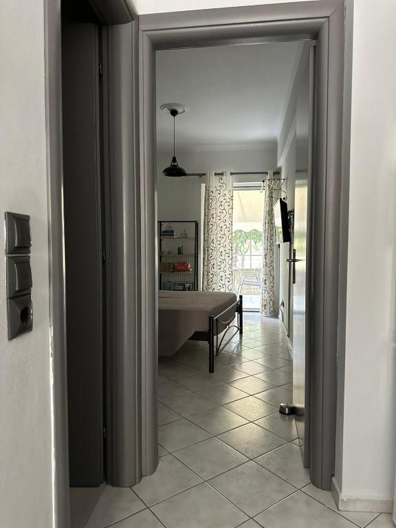 Ένα ή περισσότερα κρεβάτια σε δωμάτιο στο Iris Apartment Nafpaktos