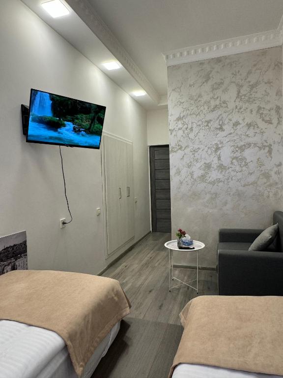Postel nebo postele na pokoji v ubytování Centroom boutique hotel