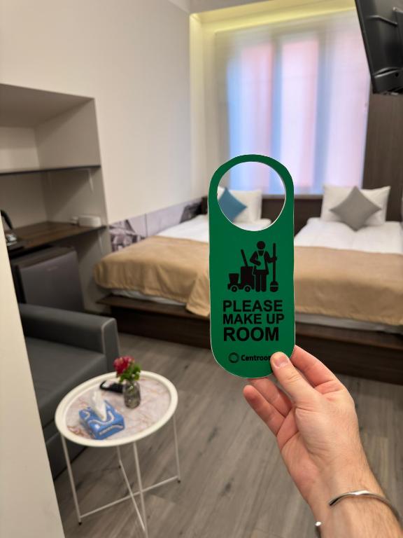 Postel nebo postele na pokoji v ubytování Centroom boutique hotel