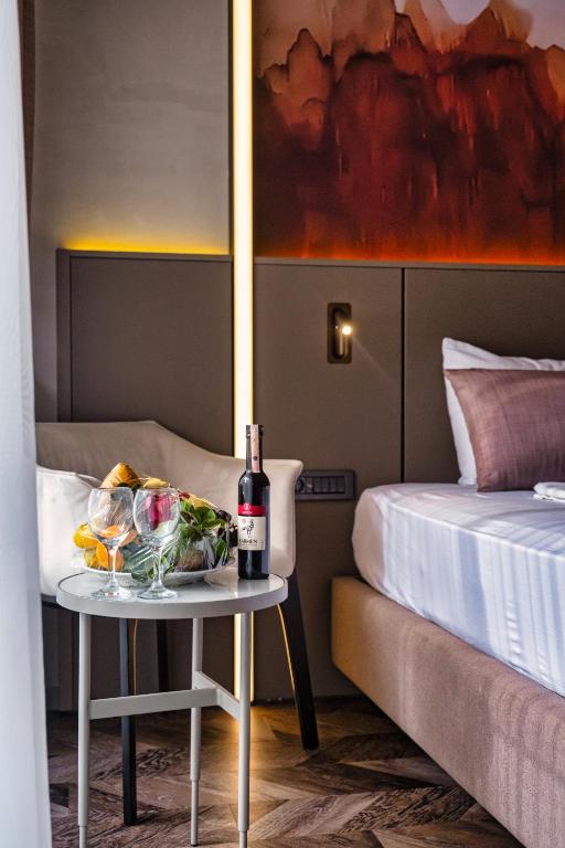 A bed or beds in a room at Kleopatra Dreams Beach Hotel