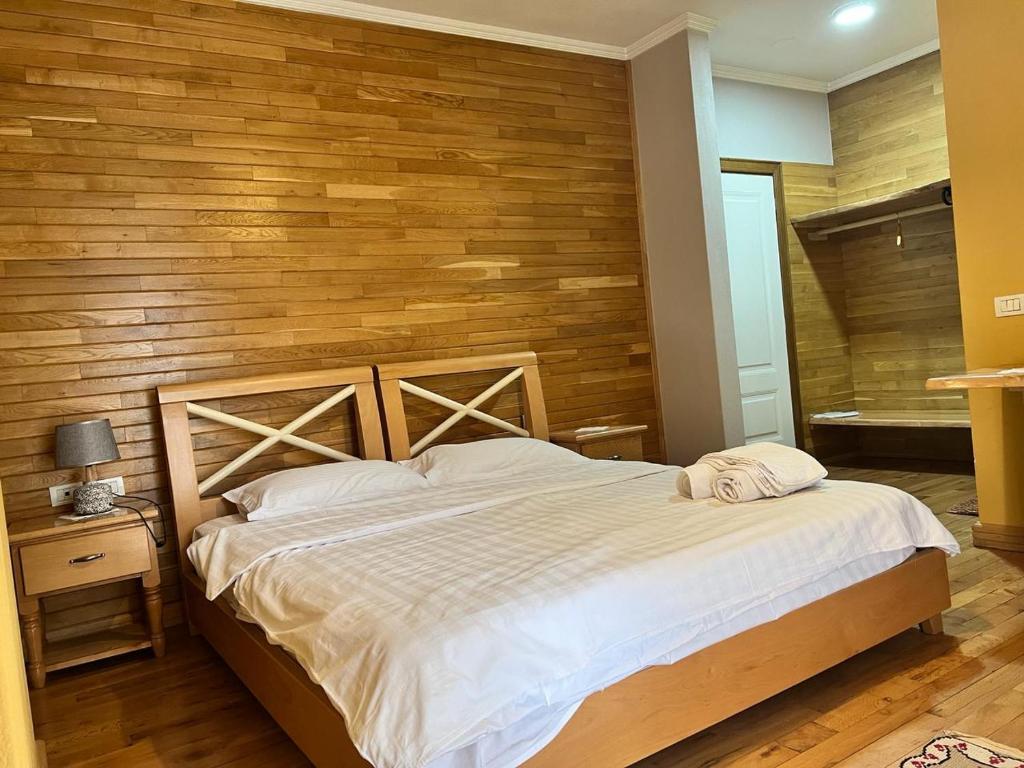 Postel nebo postele na pokoji v ubytování Hotel Bacelli Voskopoje