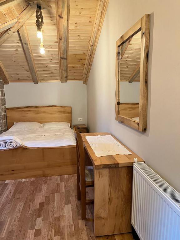 Postel nebo postele na pokoji v ubytování Hotel Bacelli Voskopoje