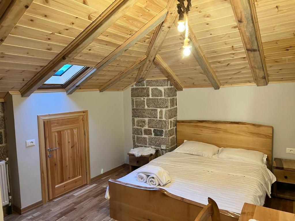 Postel nebo postele na pokoji v ubytování Hotel Bacelli Voskopoje