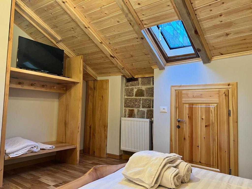 Postel nebo postele na pokoji v ubytování Hotel Bacelli Voskopoje