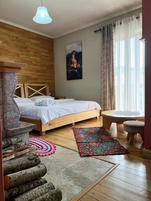 Postel nebo postele na pokoji v ubytování Hotel Bacelli Voskopoje