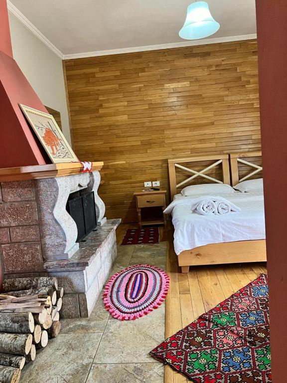 Postel nebo postele na pokoji v ubytování Hotel Bacelli Voskopoje