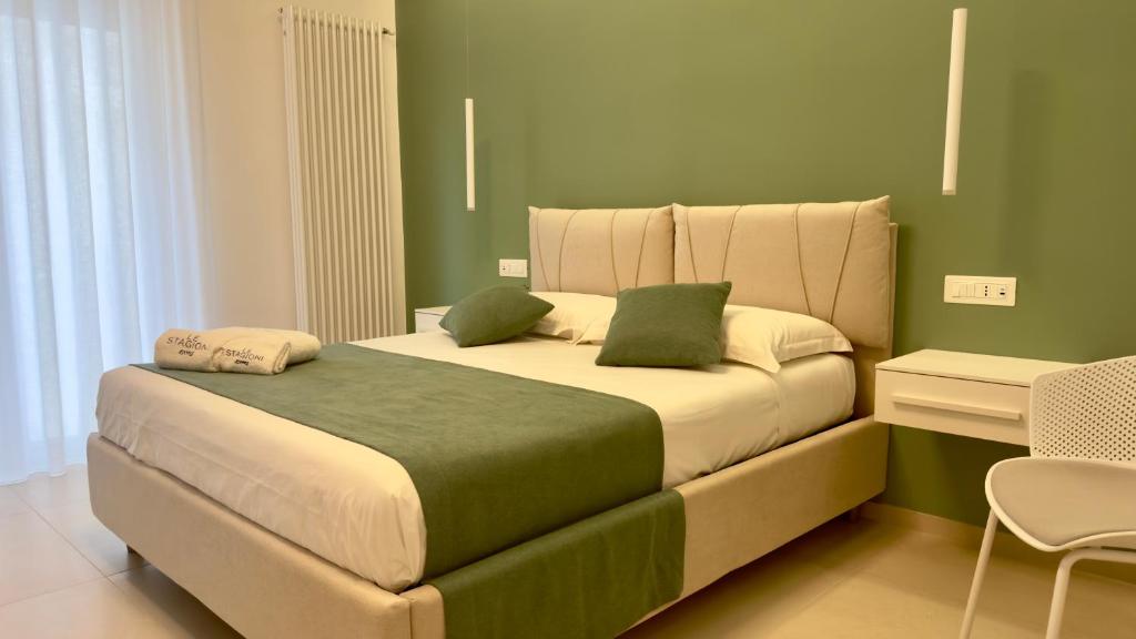 Postel nebo postele na pokoji v ubytování Le Stagioni Rooms
