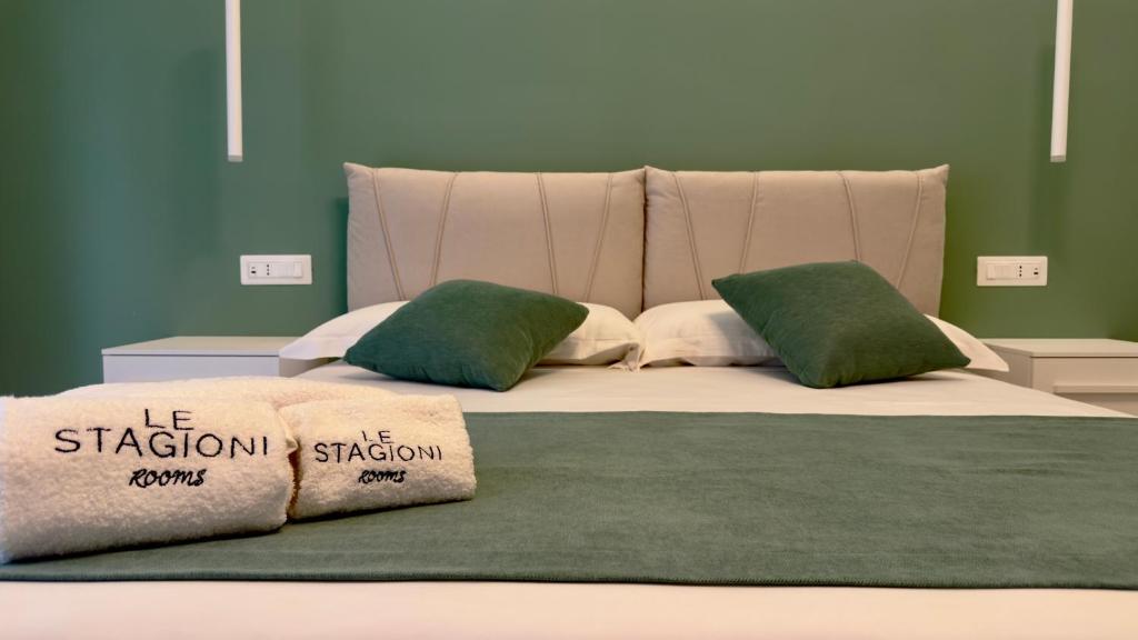 Postel nebo postele na pokoji v ubytování Le Stagioni Rooms