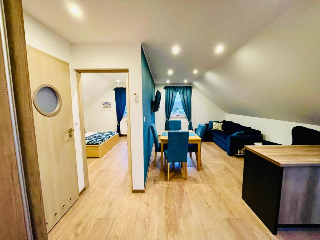 Χώρος καθιστικού στο Apartament turkusowy