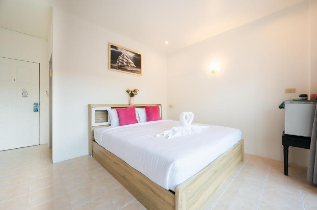 Postel nebo postele na pokoji v ubytování Fora Boutique Hotel
