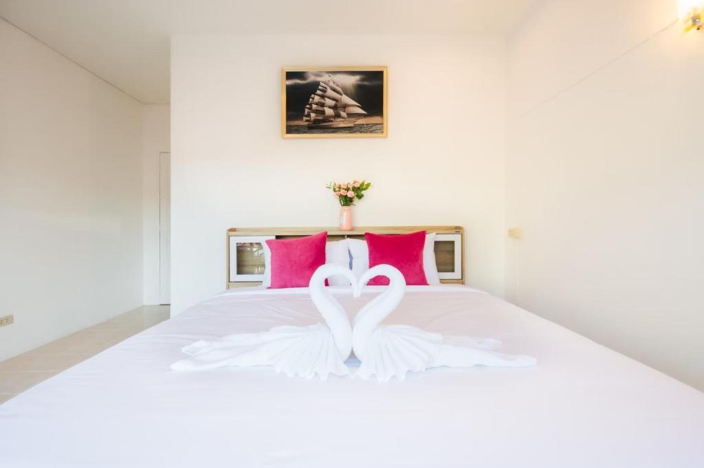 Postel nebo postele na pokoji v ubytování Fora Boutique Hotel