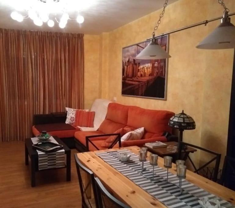 a living room with a couch and a table at Casa Capi in La Orotava