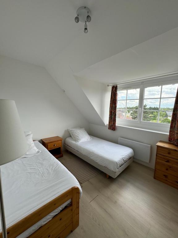 Cama ou camas em um quarto em Chez-Marion