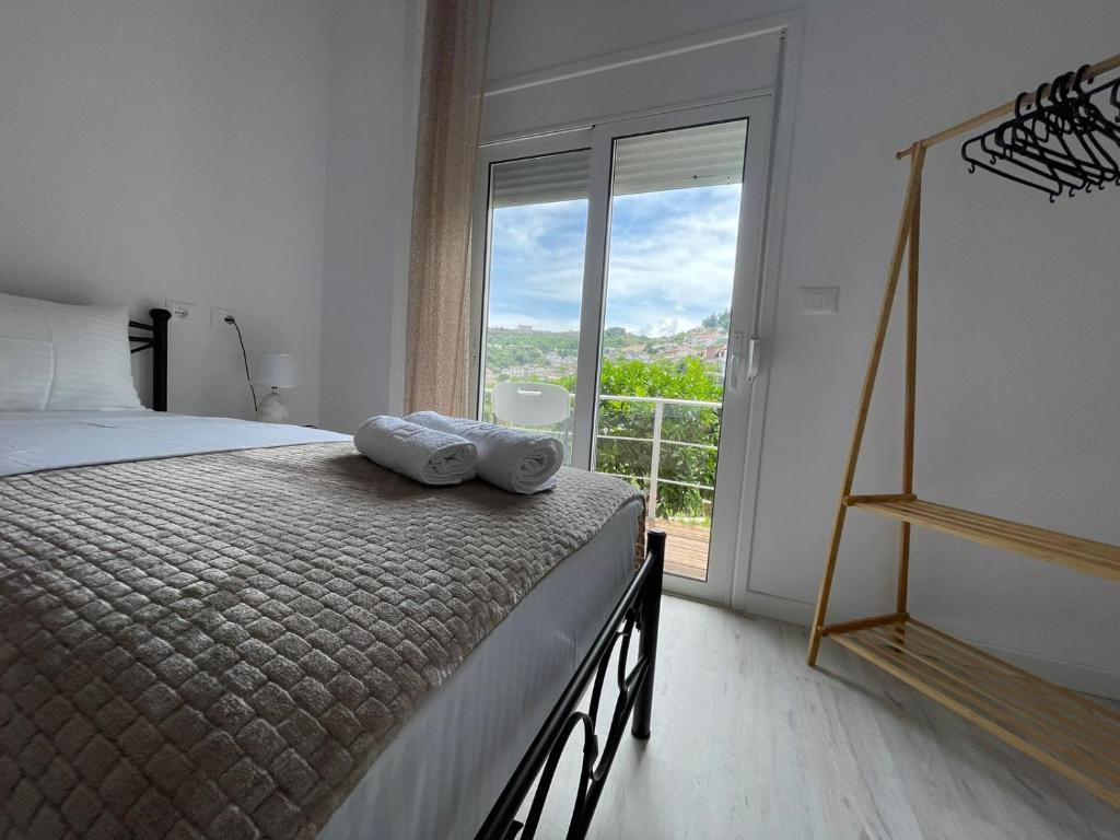 Postel nebo postele na pokoji v ubytování Ilvi Guesthouse