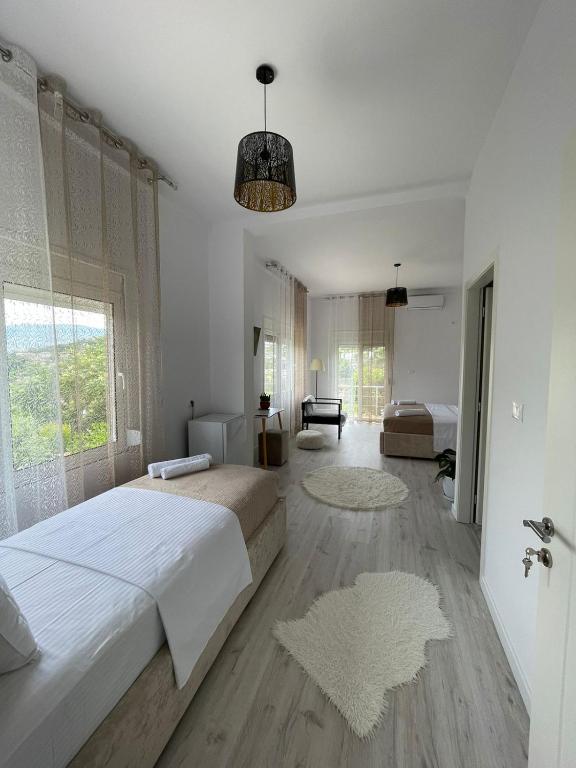 Postel nebo postele na pokoji v ubytování Ilvi Guesthouse