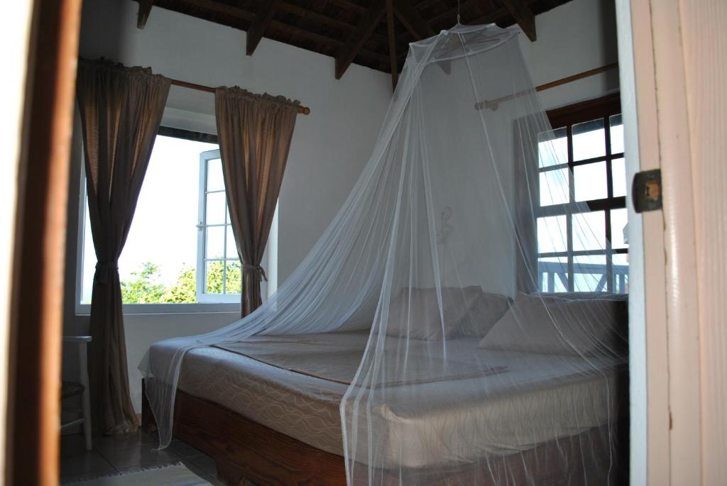 Postel nebo postele na pokoji v ubytování Villa Caribbean Dream