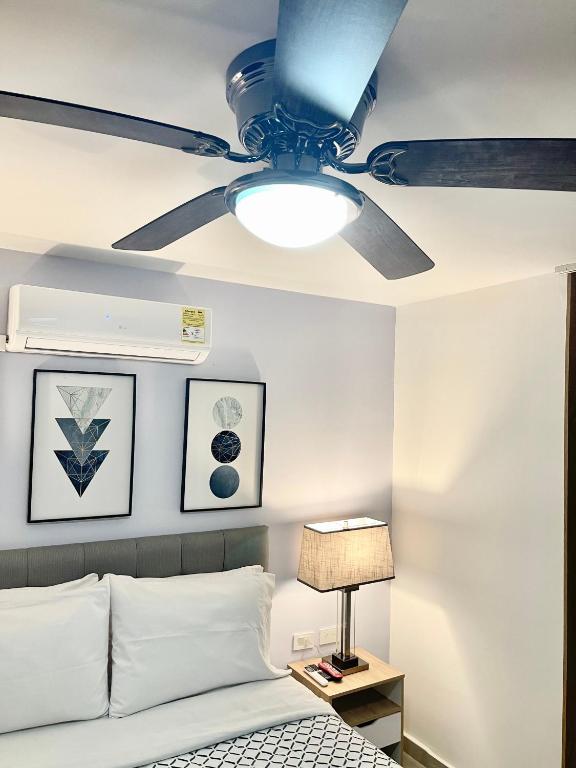 Postel nebo postele na pokoji v ubytování Cal Bed & Breakfast Ibague