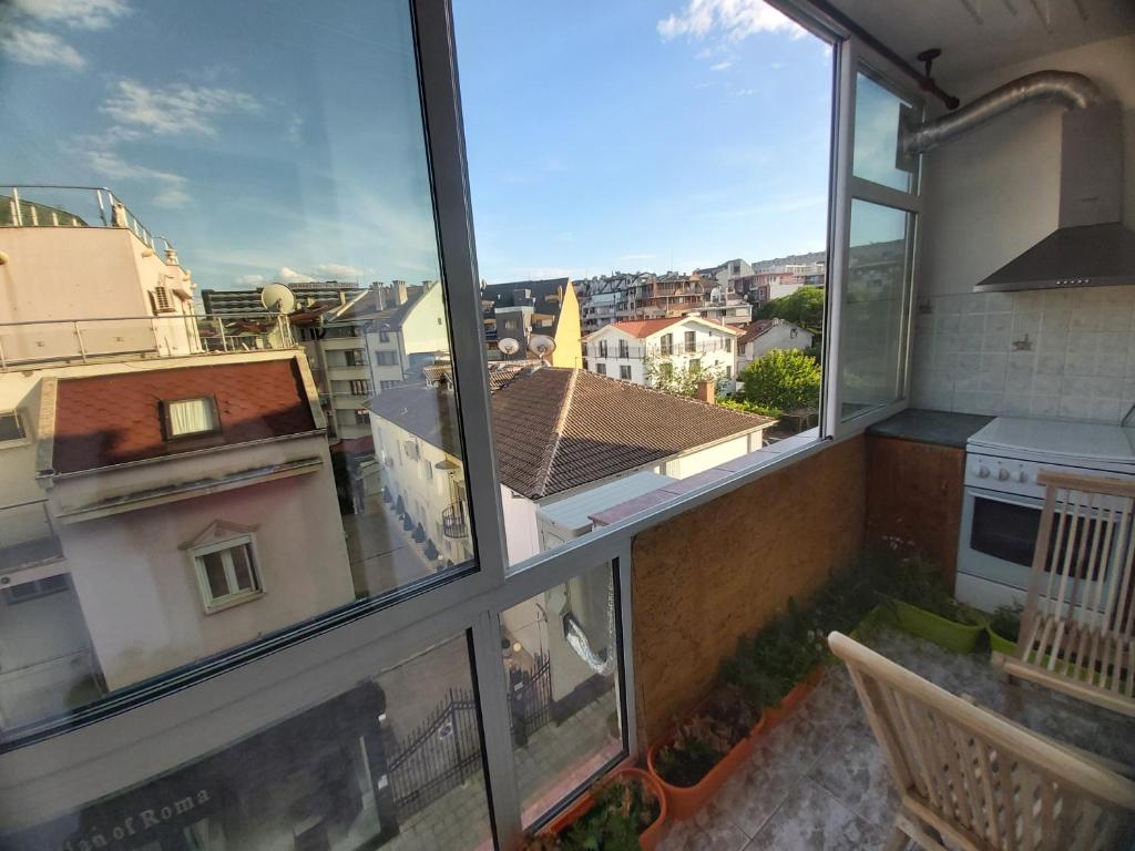 a view from the balcony of a apartment at Просторен и добре обзаведен апартамент Oborishte 39 str in Plovdiv