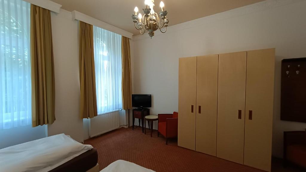 Postel nebo postele na pokoji v ubytování Ubytování Gato Božíčany