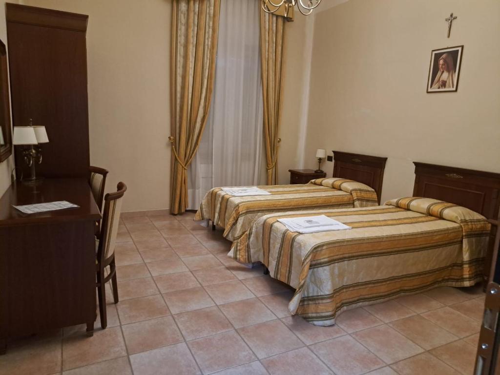Postel nebo postele na pokoji v ubytování casapaceebene