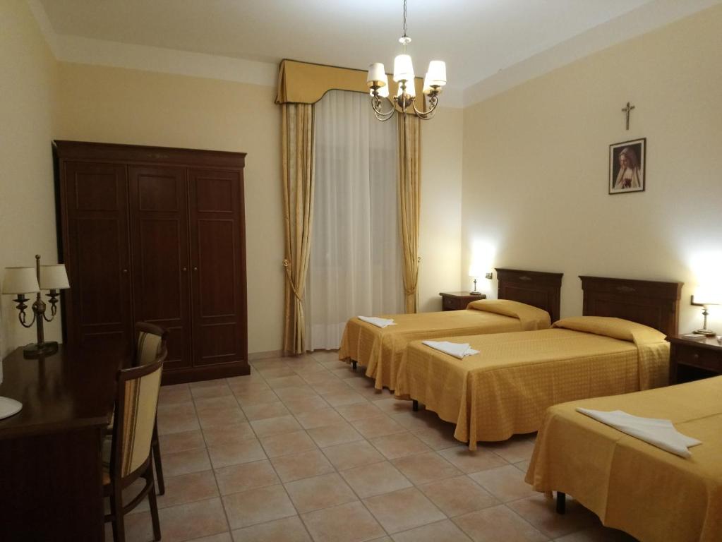 Postel nebo postele na pokoji v ubytování casapaceebene