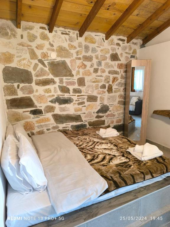 Postel nebo postele na pokoji v ubytování Mountain House Paliouras