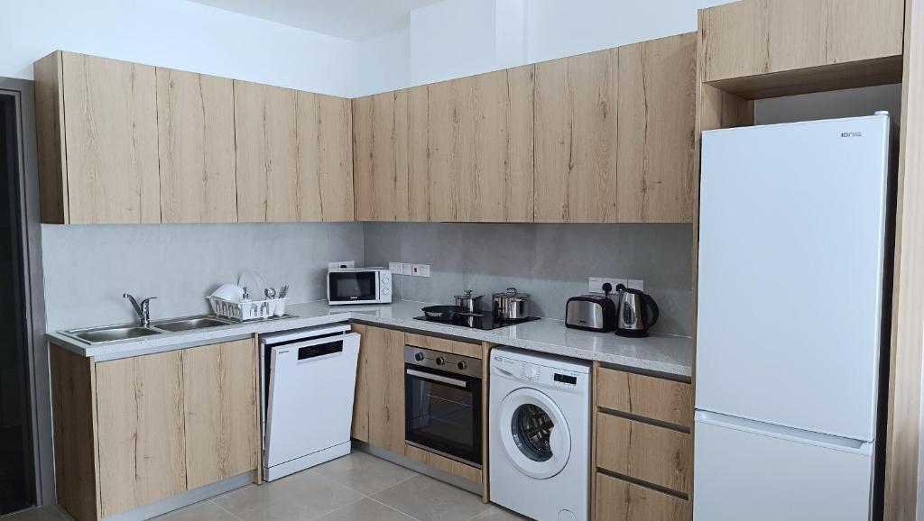 Kuchyň nebo kuchyňský kout v ubytování Larvella Estia Luxury Suites