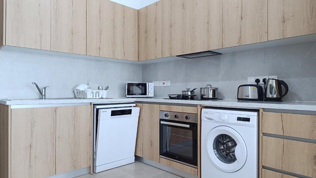 Kuchyň nebo kuchyňský kout v ubytování Larvella Estia Luxury Suites
