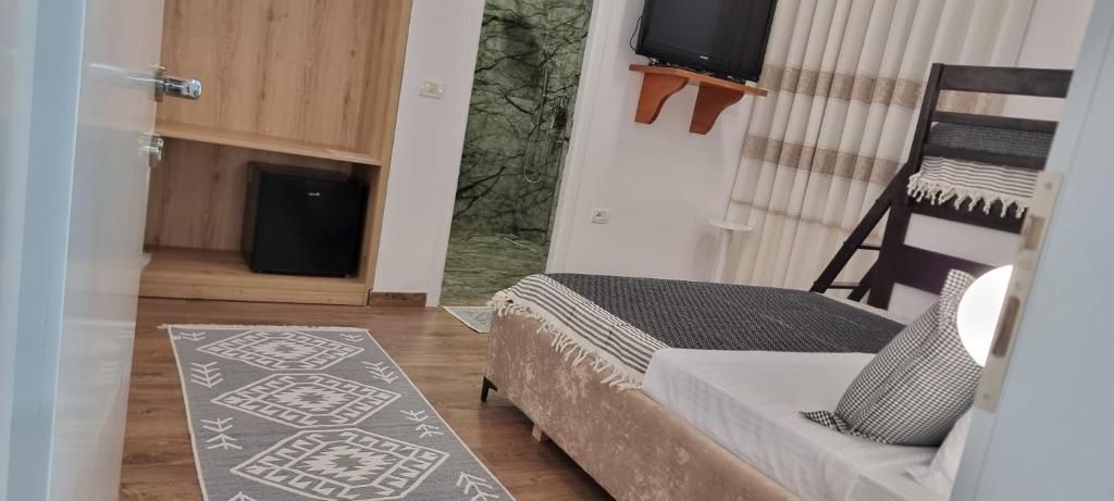 Postel nebo postele na pokoji v ubytování Salillari Guest house