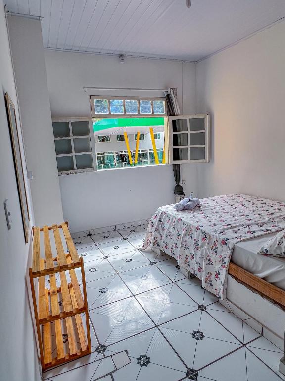 Postel nebo postele na pokoji v ubytování Pousada Sempre Viva Lençóis