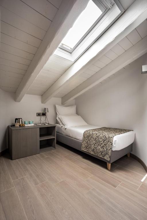 Postel nebo postele na pokoji v ubytování Agriturismo Treterre
