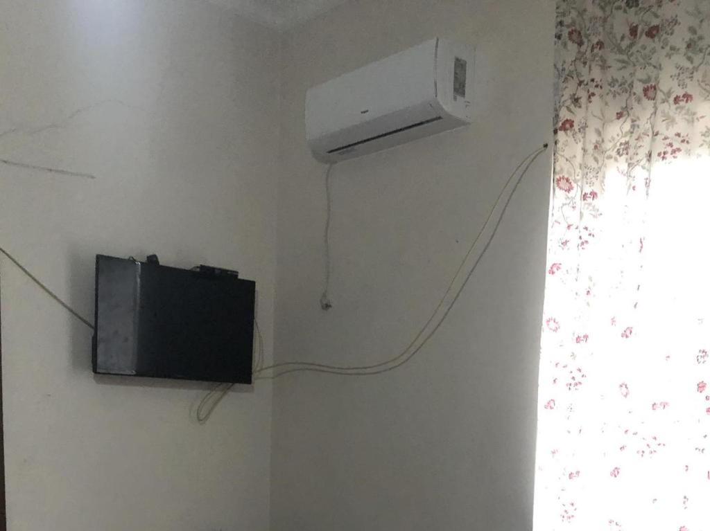 TV a/nebo společenská místnost v ubytování dom v kobuleti