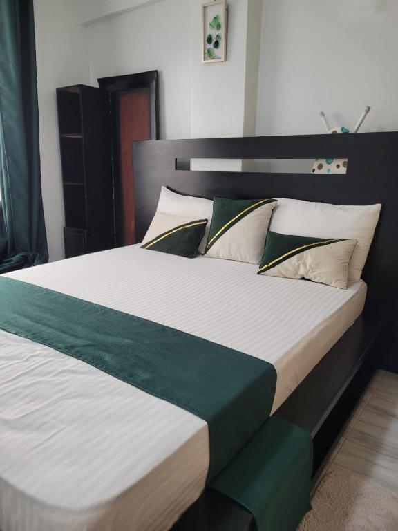 Postel nebo postele na pokoji v ubytování Rubbie Luxury
