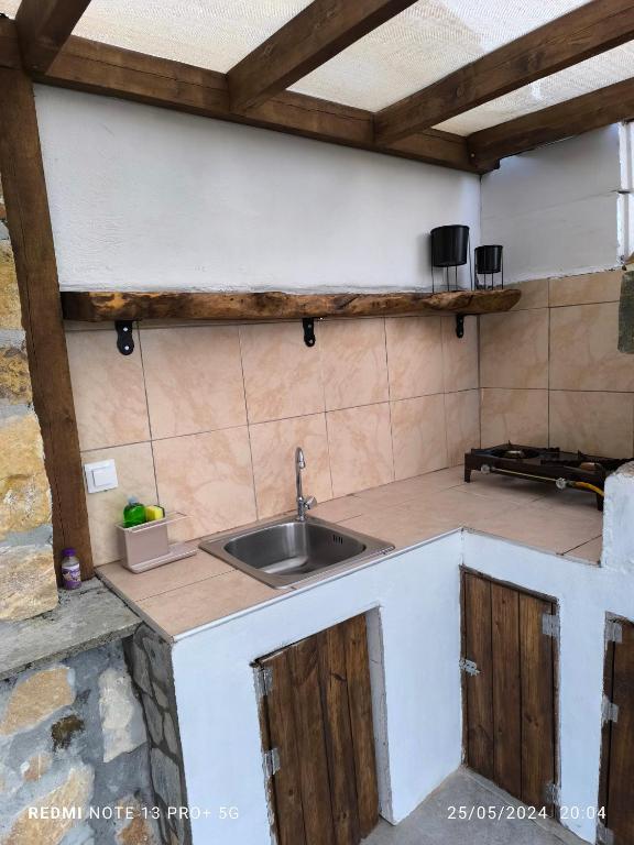 Kuchyň nebo kuchyňský kout v ubytování Mountain House Paliouras