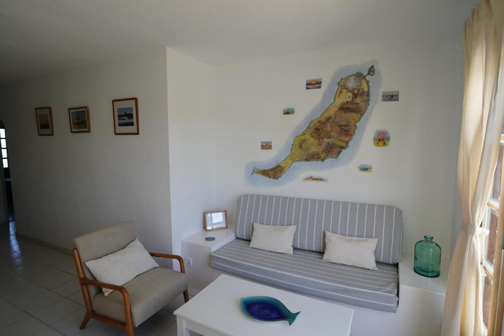 Posezení v ubytování El Caleton Garden Apartment