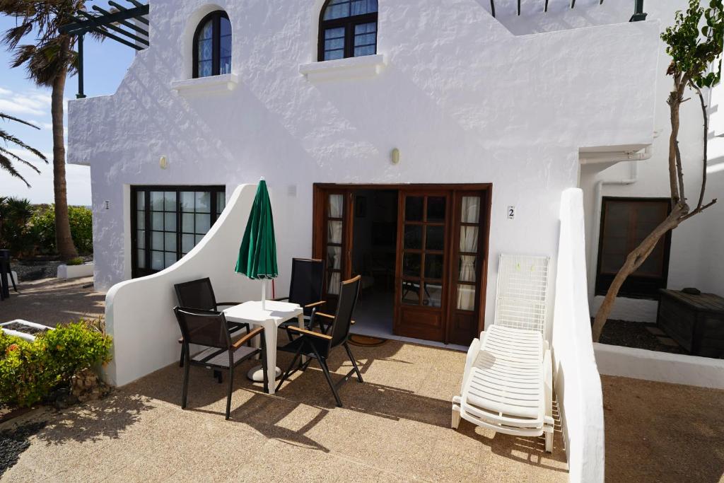Patio nebo venkovní prostory v ubytování El Caleton Garden Apartment