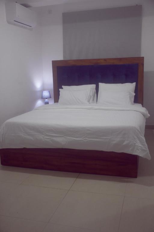 Postel nebo postele na pokoji v ubytování The Motel One - Colombo Border