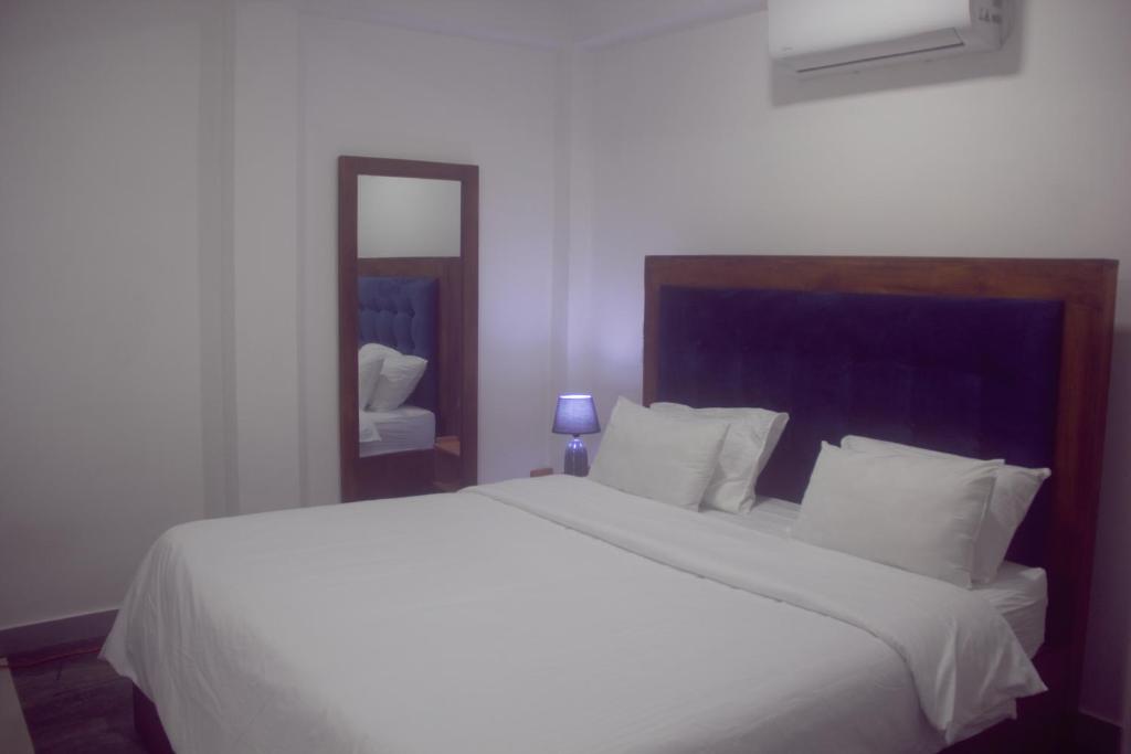 Postel nebo postele na pokoji v ubytování The Motel One - Colombo Border