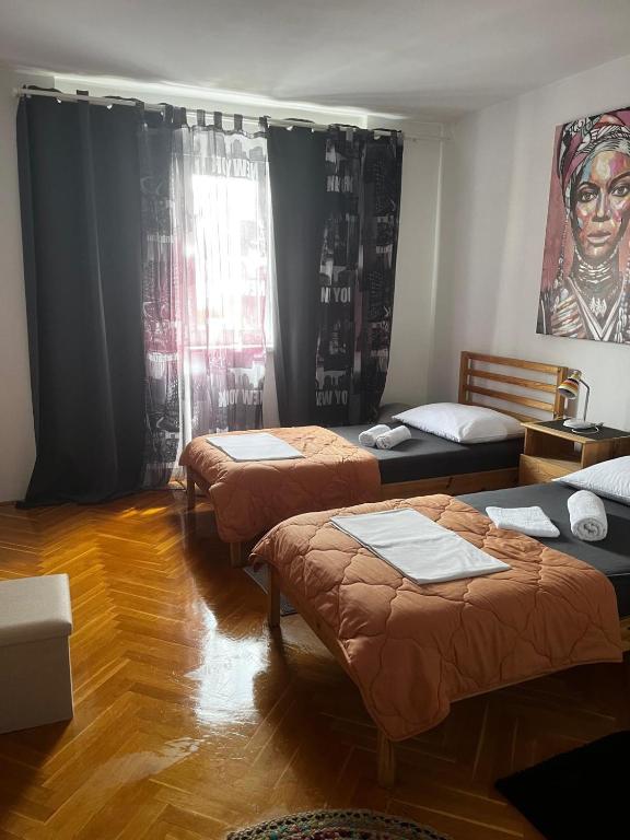 Postel nebo postele na pokoji v ubytování Split Downtown