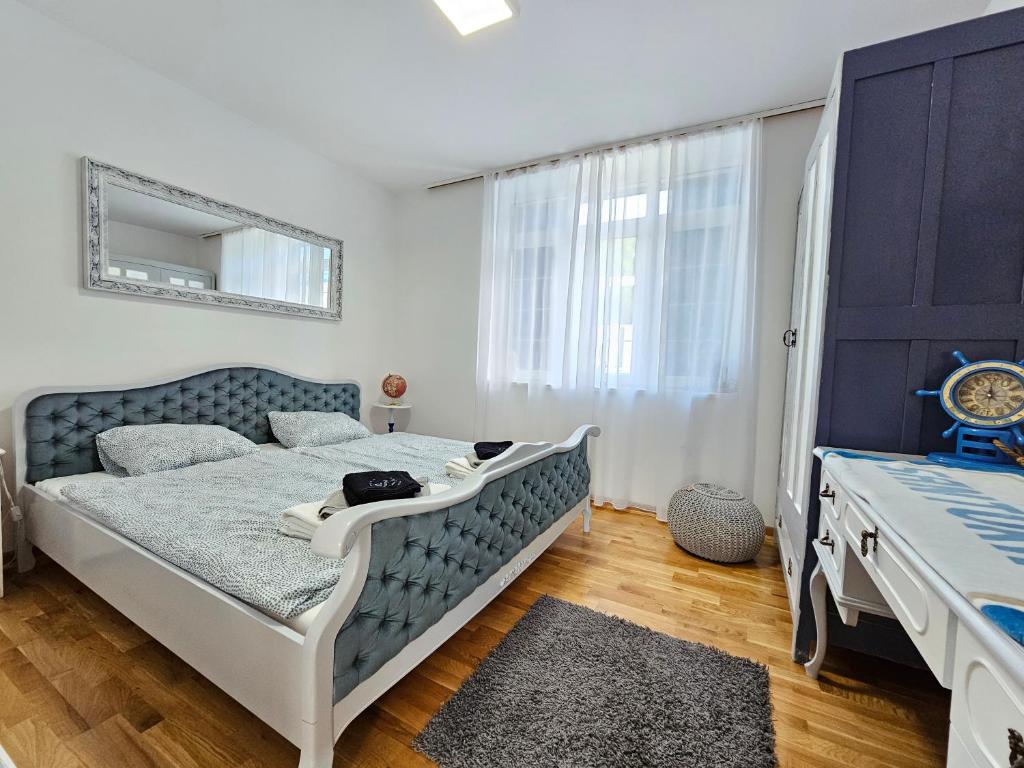 Postel nebo postele na pokoji v ubytování Vila Santorini Nacionalni Park Fruška Gora