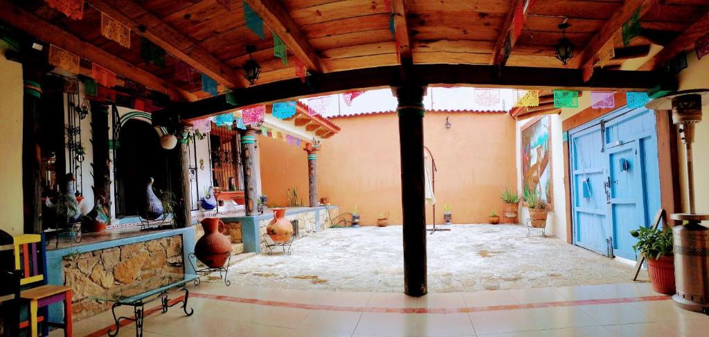 Postel nebo postele na pokoji v ubytování Hotel Tierra Maya
